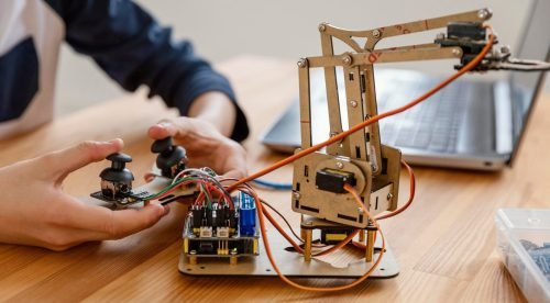 child-making-robot-close-up_23-2148863376